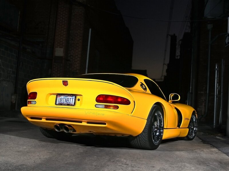 Yellow Dodge Viper in alley