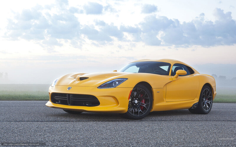 Yellow Dodge Viper on a road