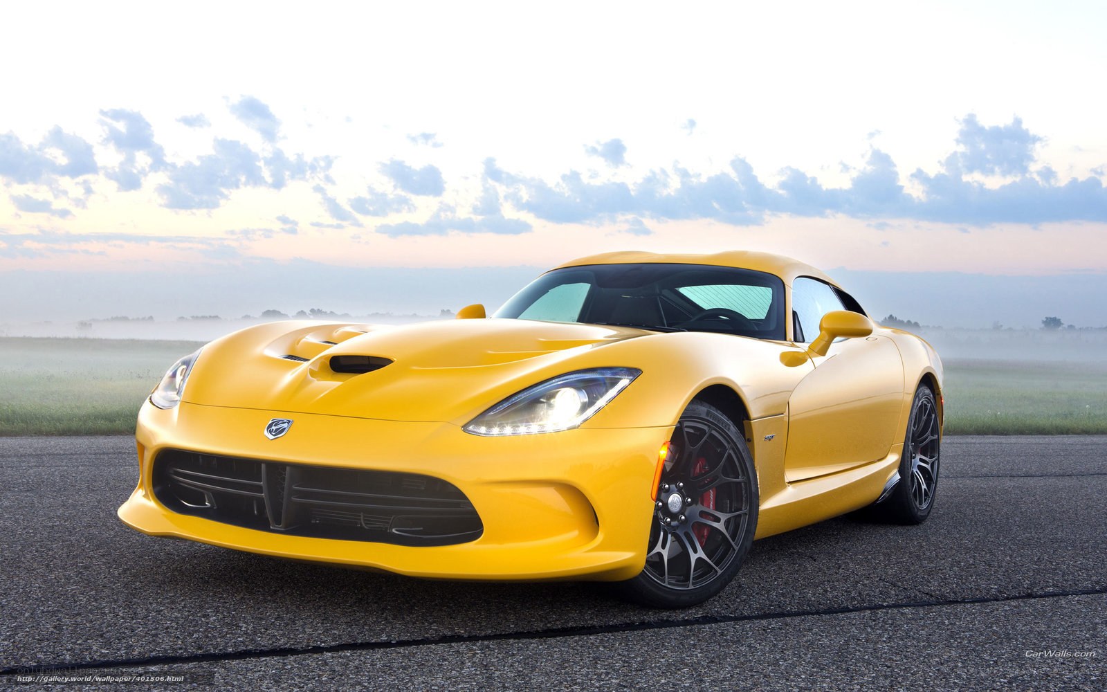 Yellow Dodge Viper on a road