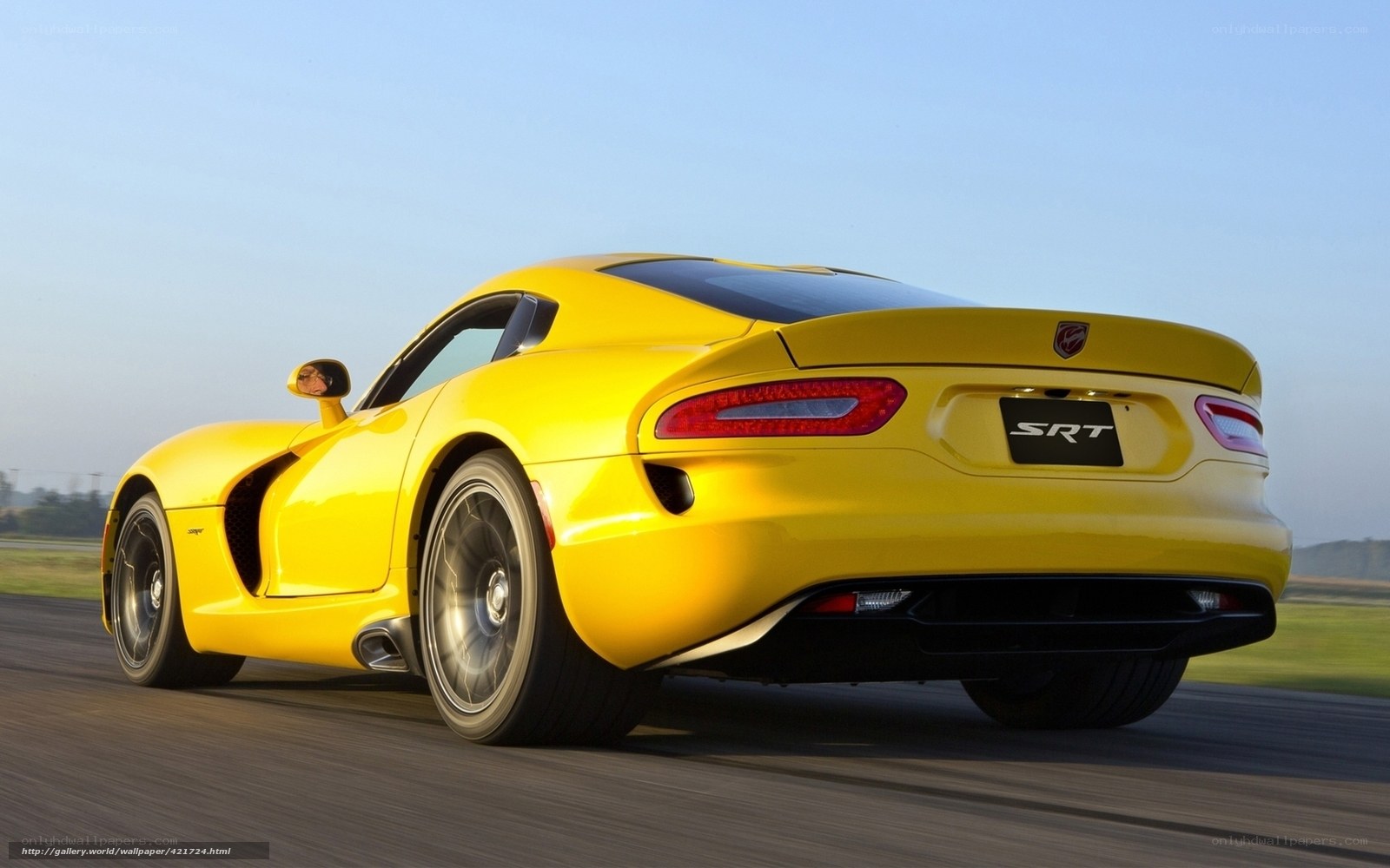 Yellow Dodge Viper SRT on track