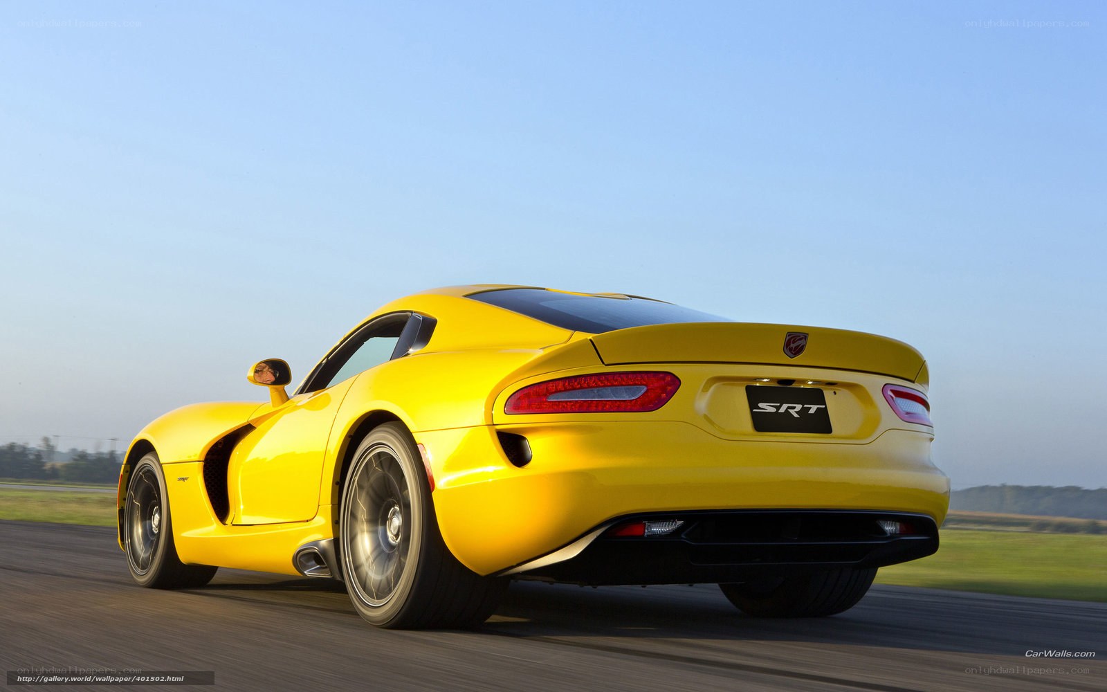 Yellow Dodge Viper SRT on track