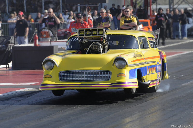 Yellow Drag Racing Car — Dynamic, Afternoon, Photograph, Crowd, Fire Extinguisher
