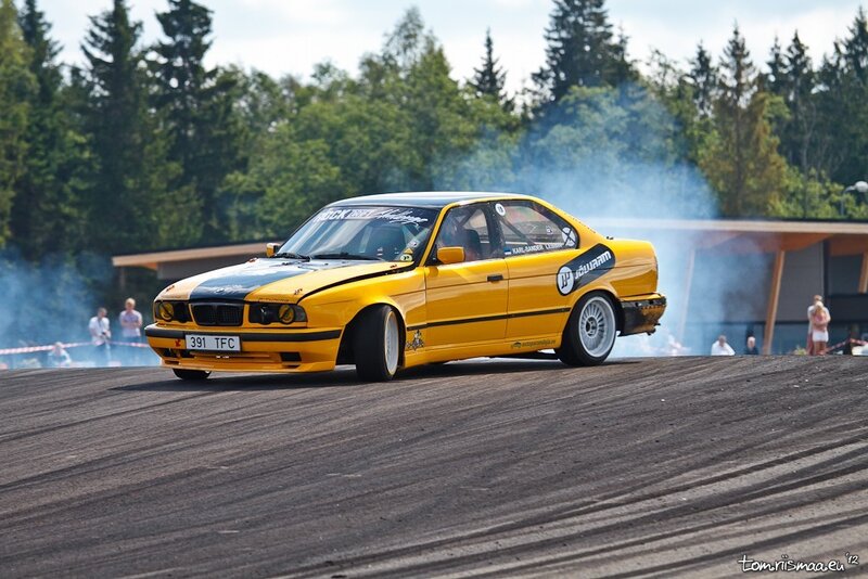 Yellow Drift Car — Dynamic, Afternoon, Photograph, Smoke, Spectators