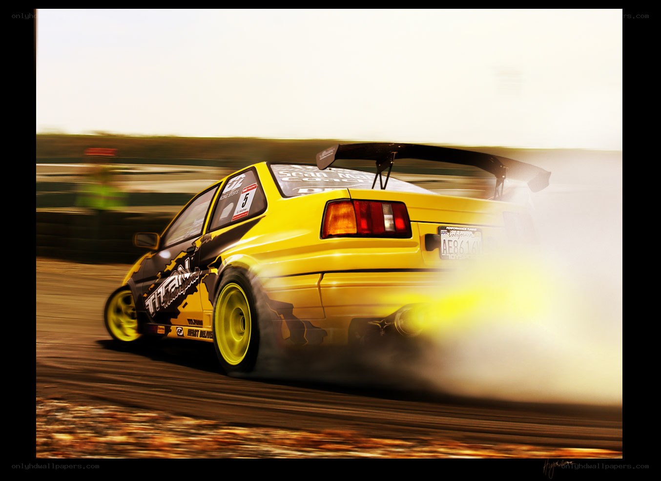 Yellow drift car in action
