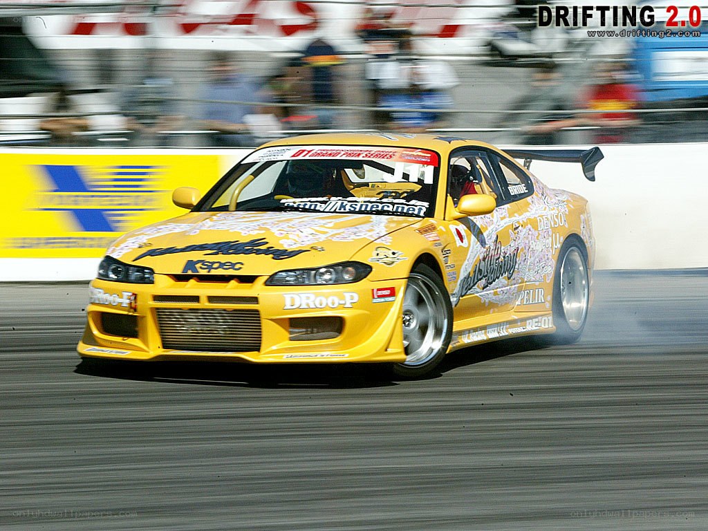 yellow drift car in action