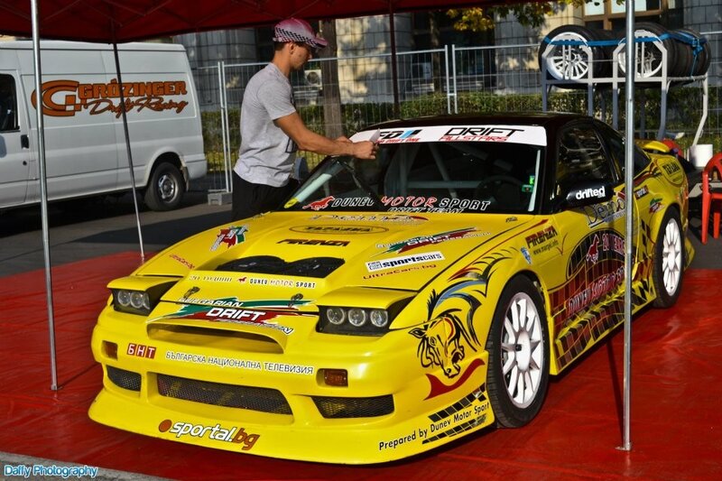 Yellow drift car on display