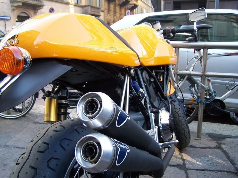 Yellow Ducati motorcycle on street