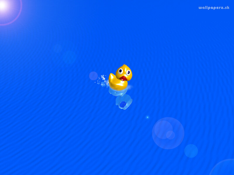 yellow duck floating on blue water