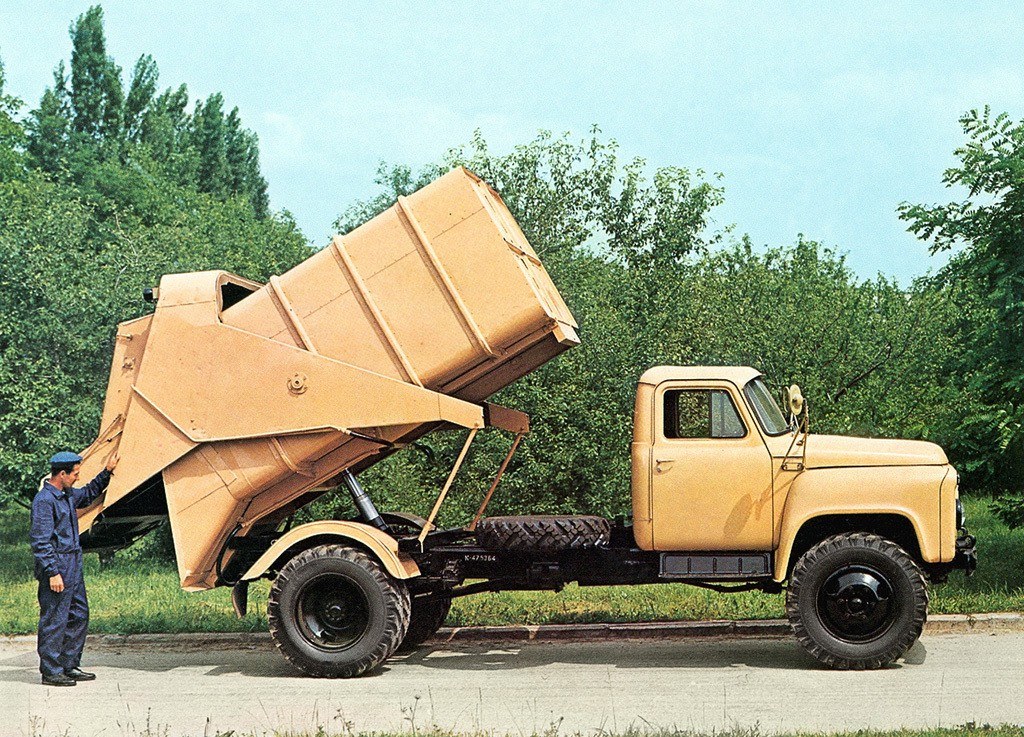 Yellow dump truck in action
