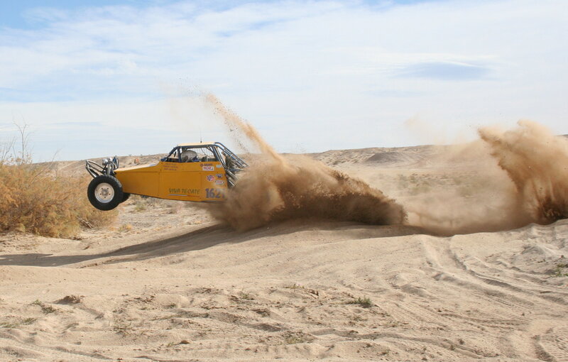 Yellow dune buggy racing