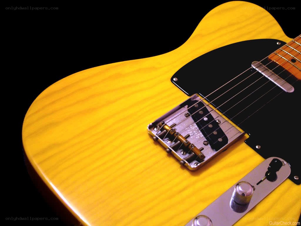 yellow electric guitar body