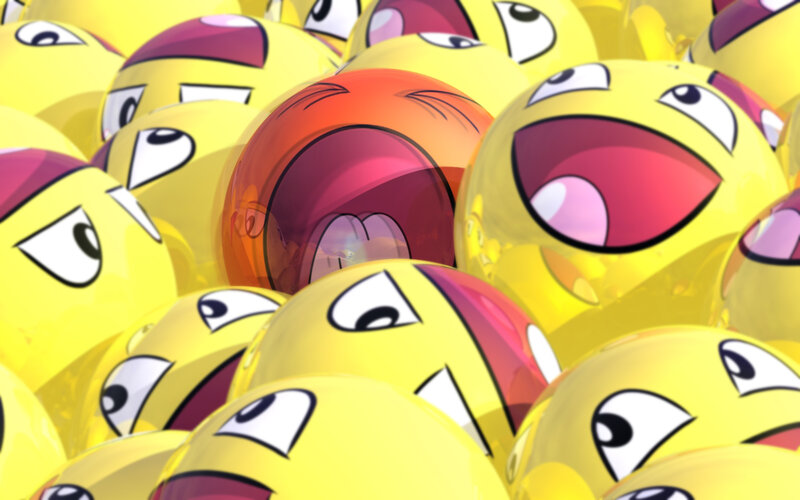 yellow emoji balls with one red