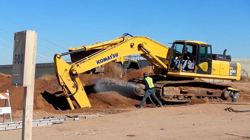 Yellow Excavator Digging — Active, Afternoon