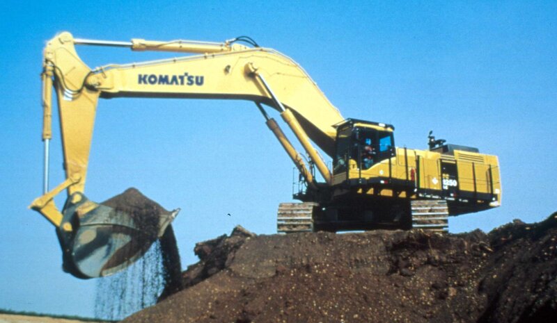 Yellow Excavator Digging