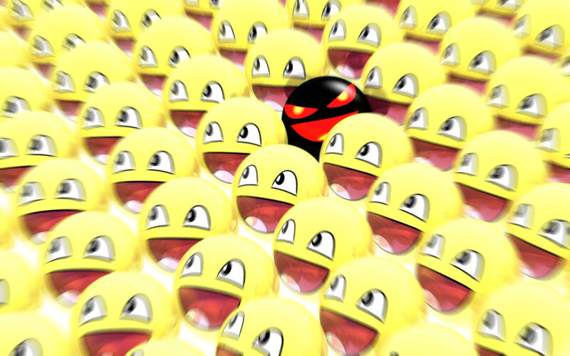 yellow faces with one black face