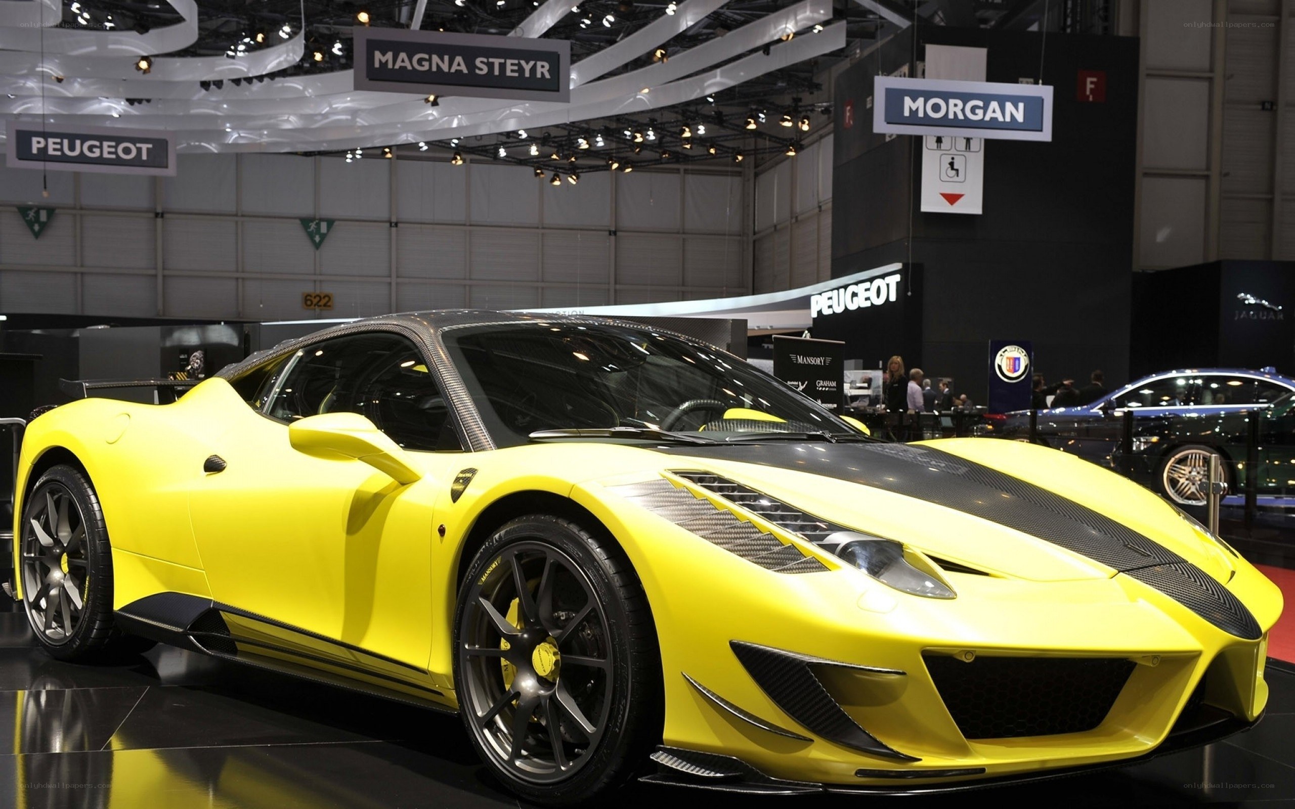 Yellow Ferrari at auto show
