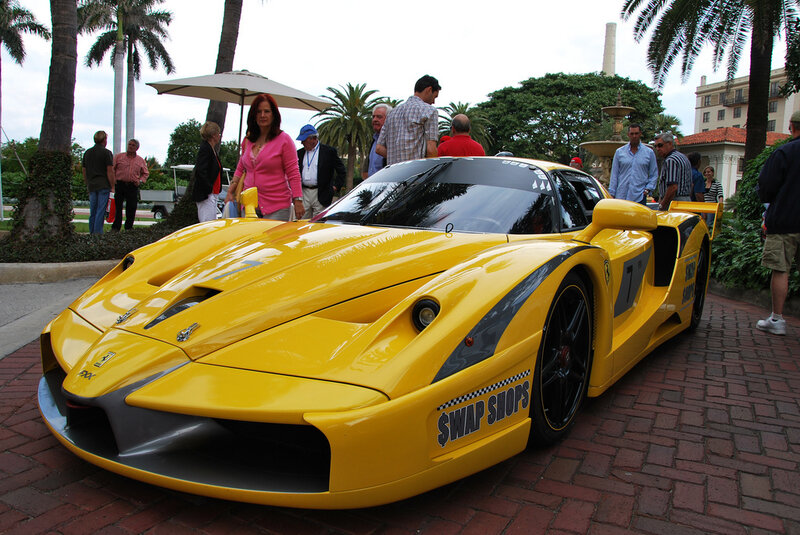 Yellow Ferrari at outdoor event