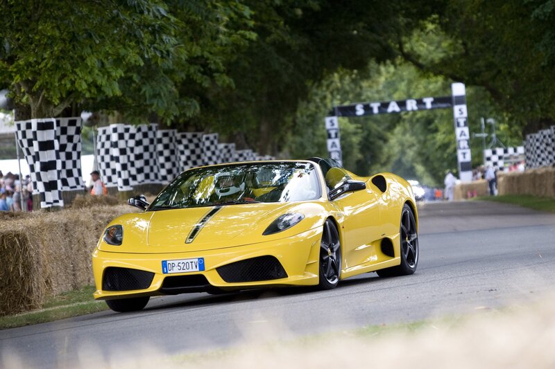 Yellow Ferrari at start line