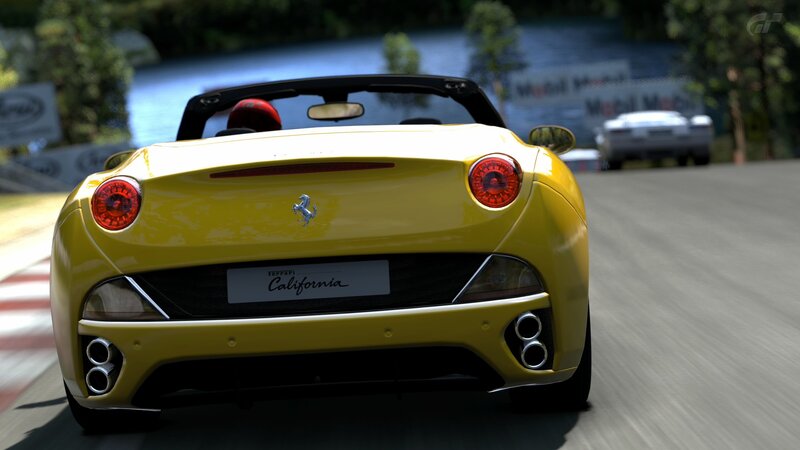 Yellow Ferrari California on track