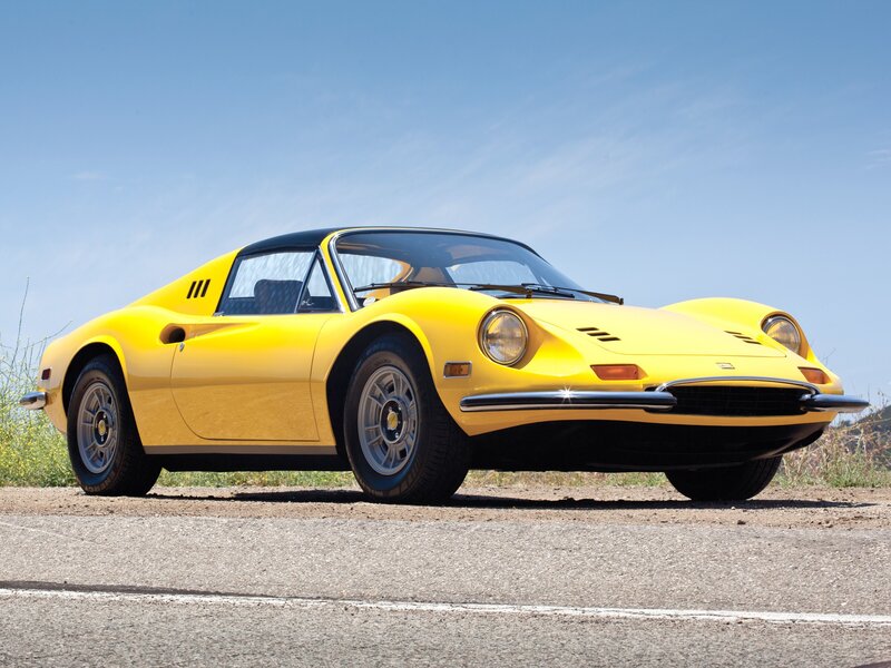 Yellow Ferrari Dino sports car