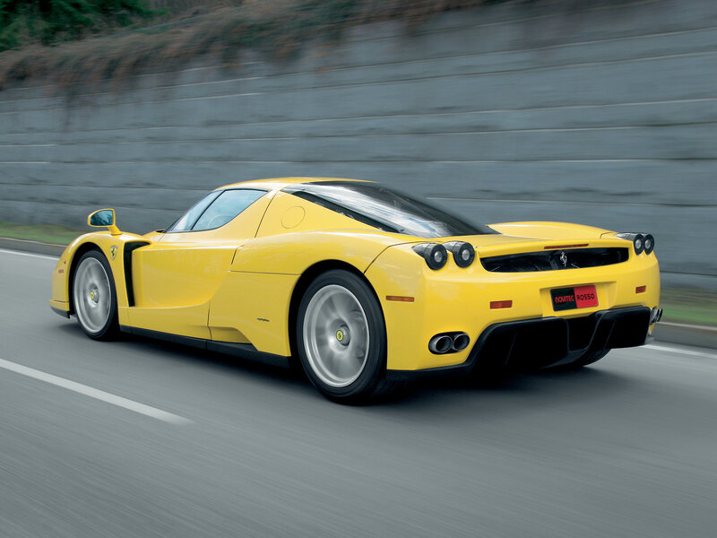 Yellow Ferrari Enzo in motion