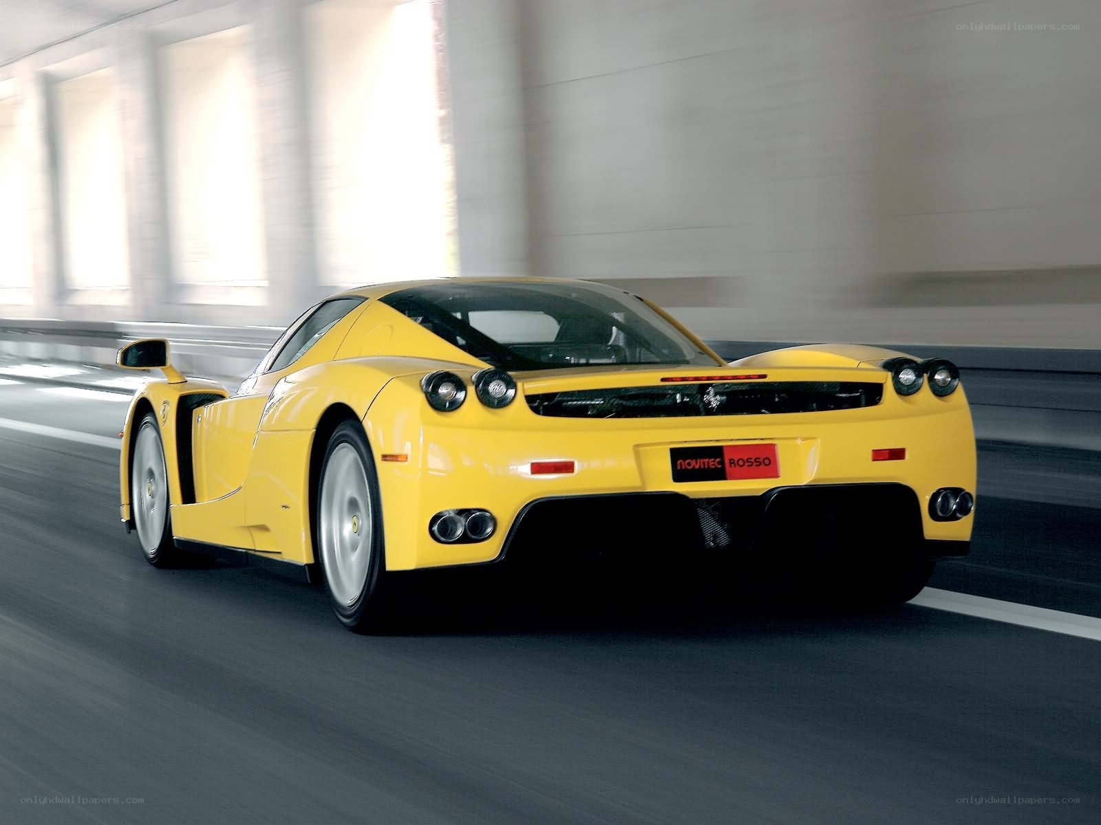 Yellow Ferrari Enzo in tunnel