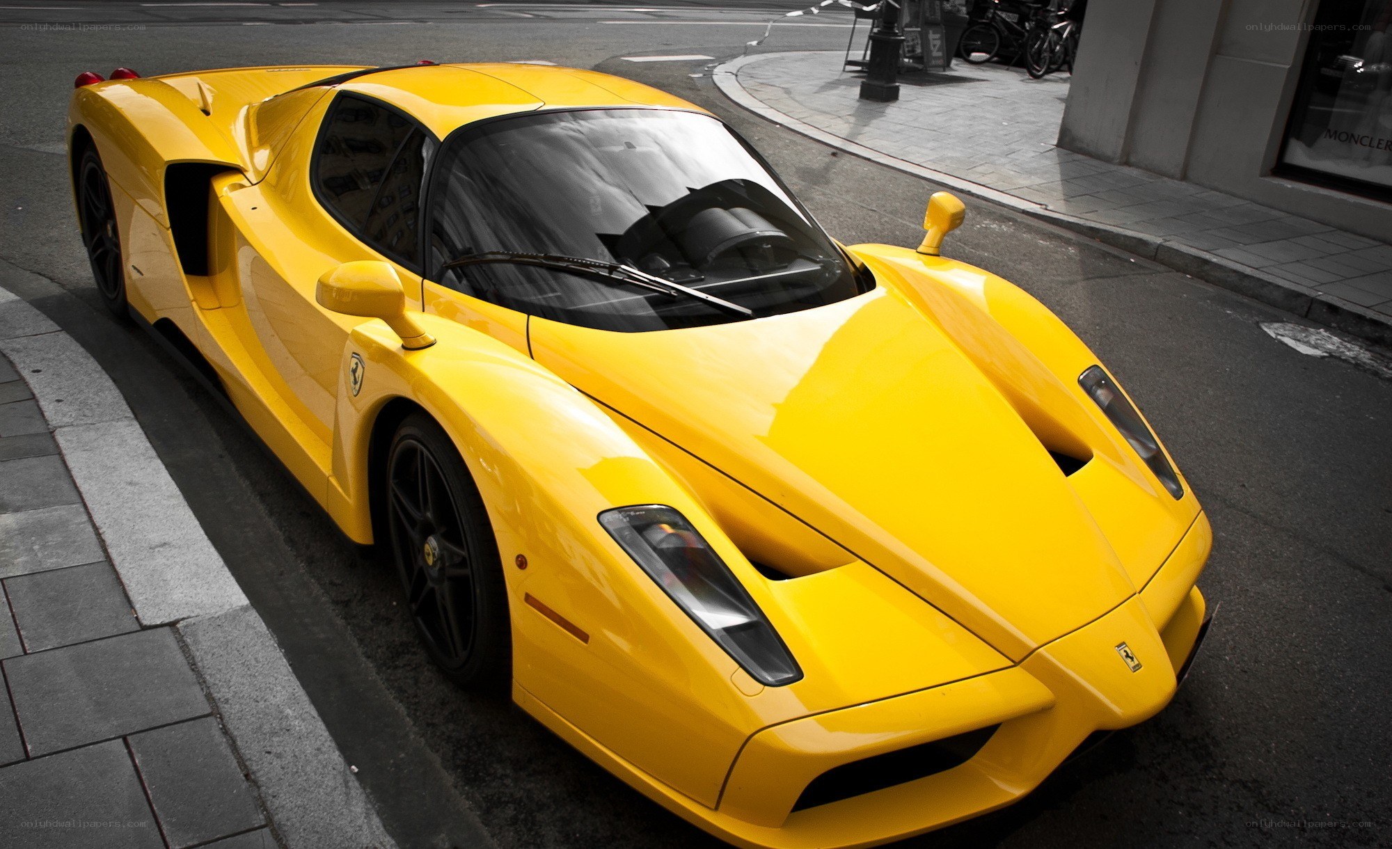 Yellow Ferrari Enzo parked