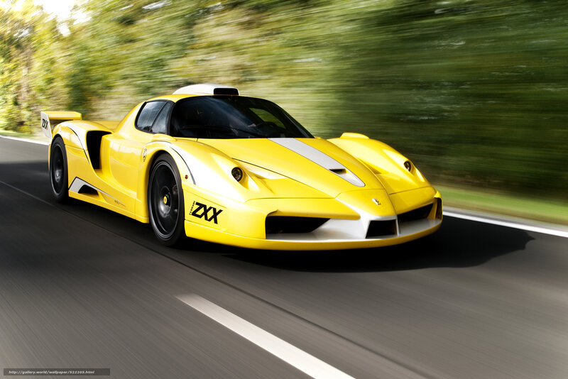Yellow Ferrari FXX in motion