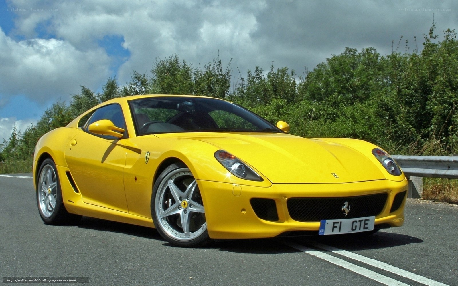Yellow Ferrari GTE on road