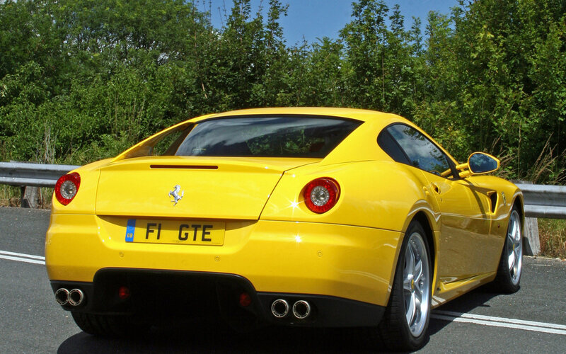 yellow Ferrari GTE sports car