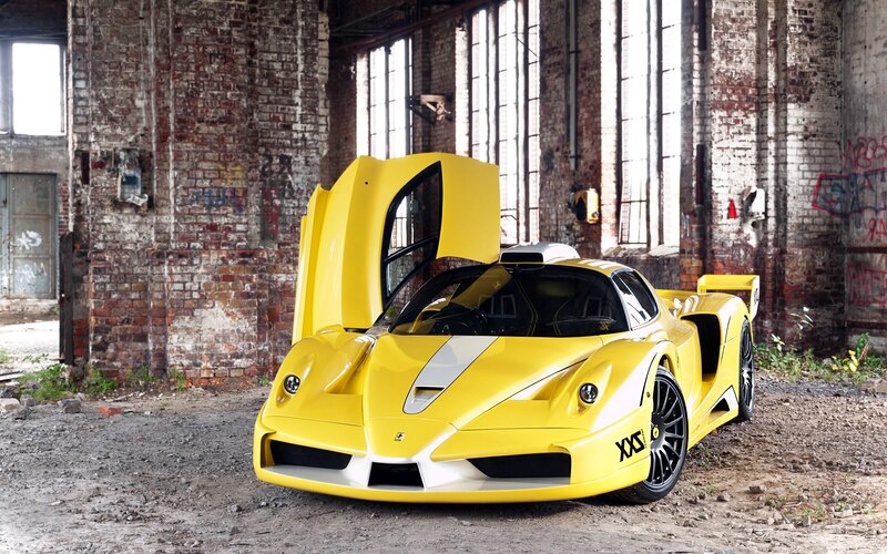 Yellow Ferrari in an abandoned warehouse
