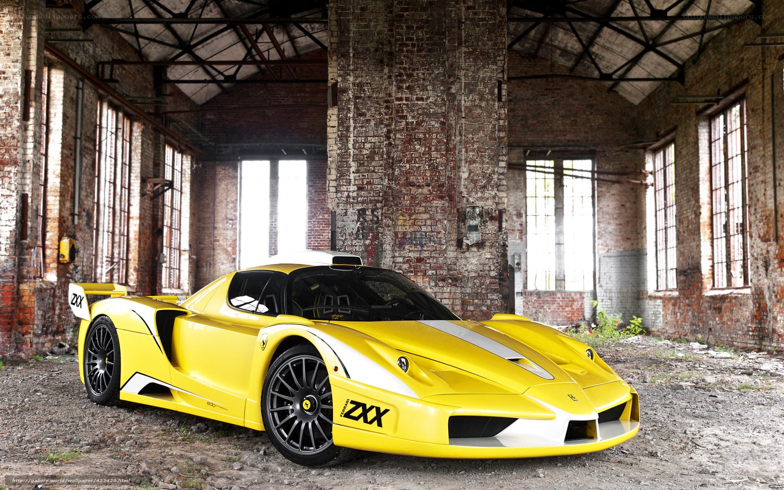 Yellow Ferrari in an old factory