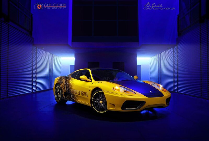 yellow ferrari in blue tunnel