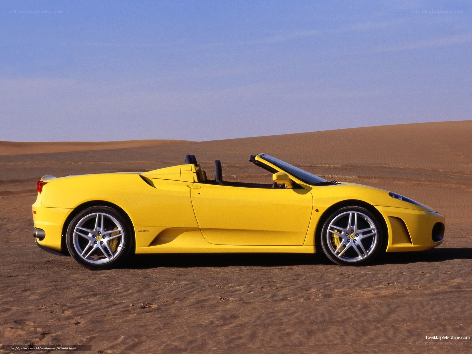 yellow ferrari in desert