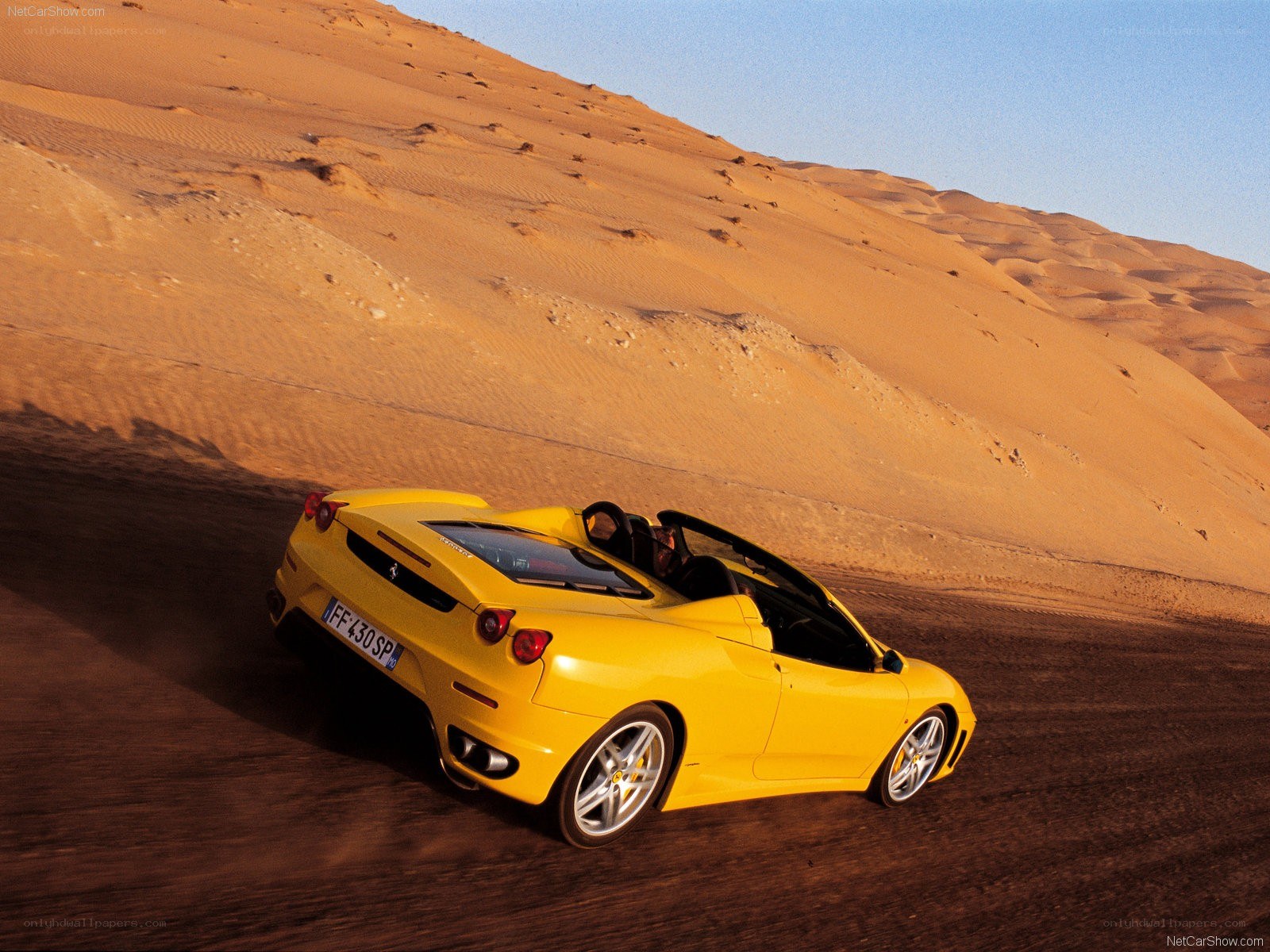 Yellow Ferrari in desert
