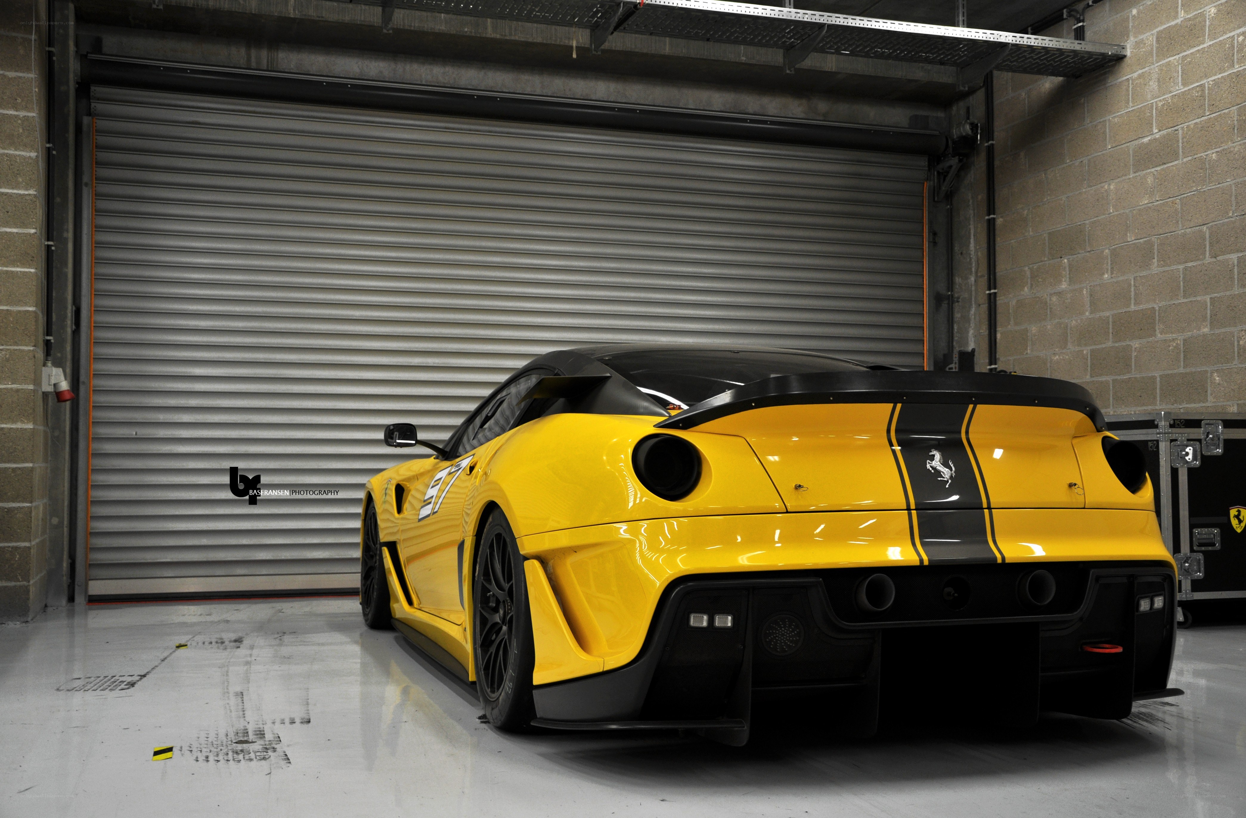 Yellow Ferrari in garage