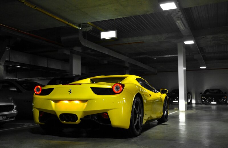 Yellow Ferrari in Garage — Dramatic