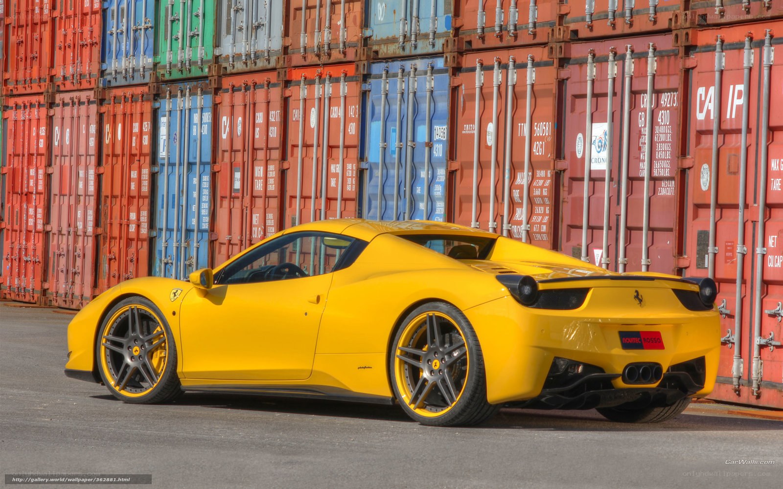 Yellow Ferrari in shipping yard