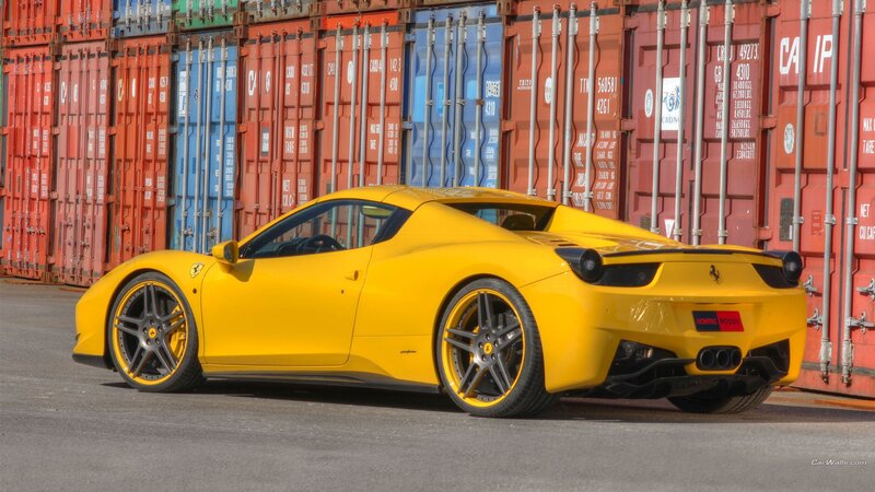 Yellow Ferrari in shipping yard