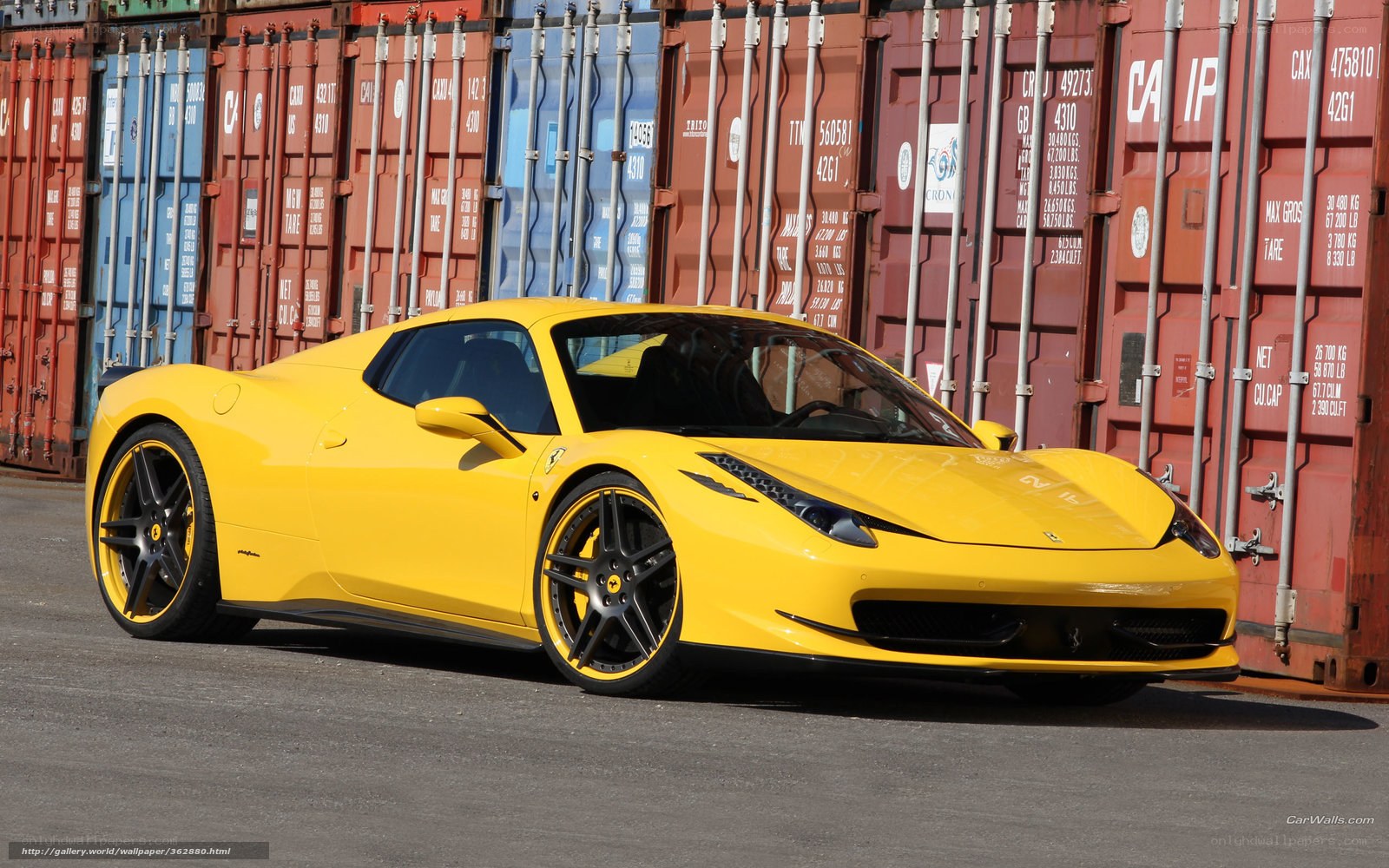 Yellow Ferrari in shipping yard
