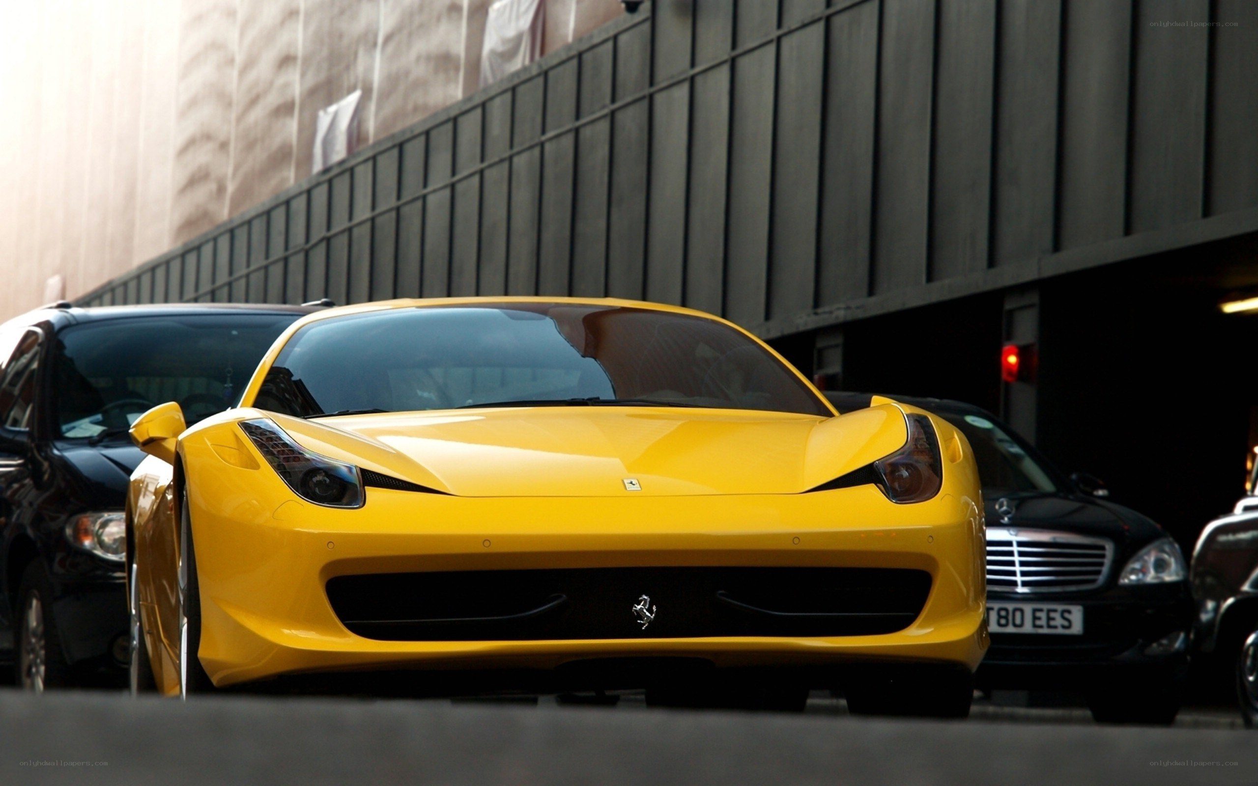 Yellow Ferrari in urban setting
