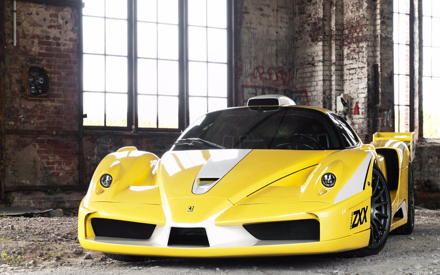 Yellow Ferrari in warehouse