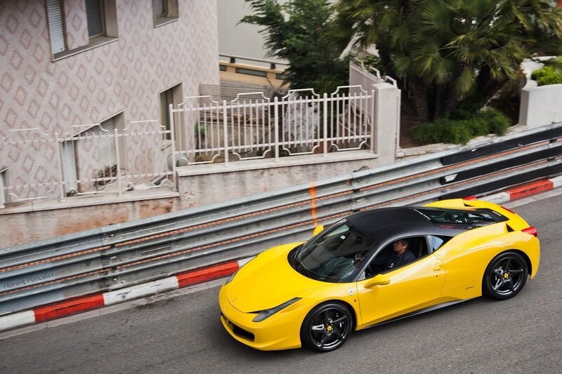Yellow Ferrari on a city street