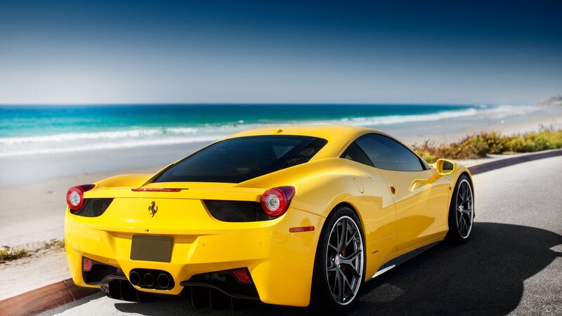 Yellow Ferrari on Beach
