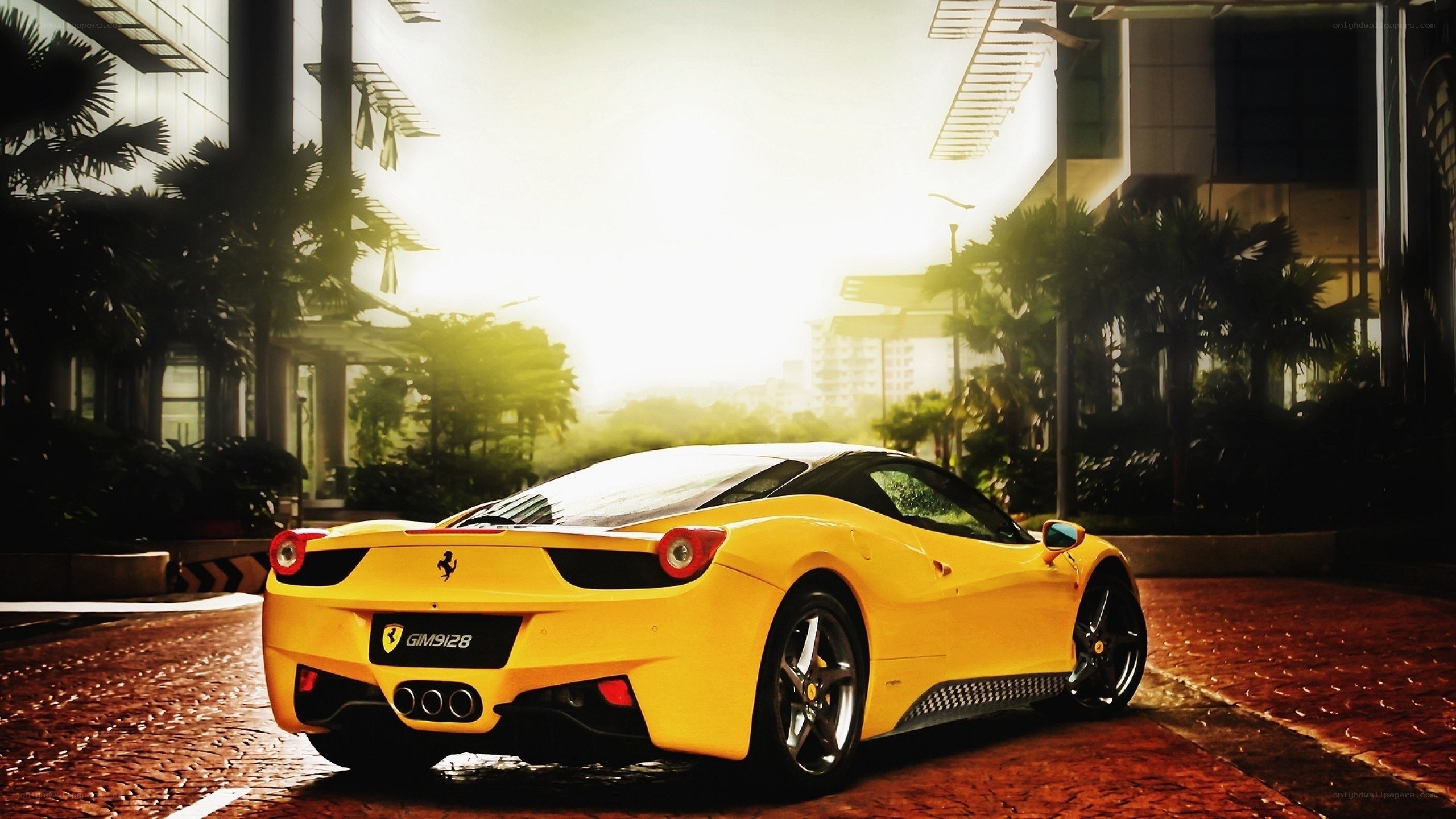 Yellow Ferrari on city street