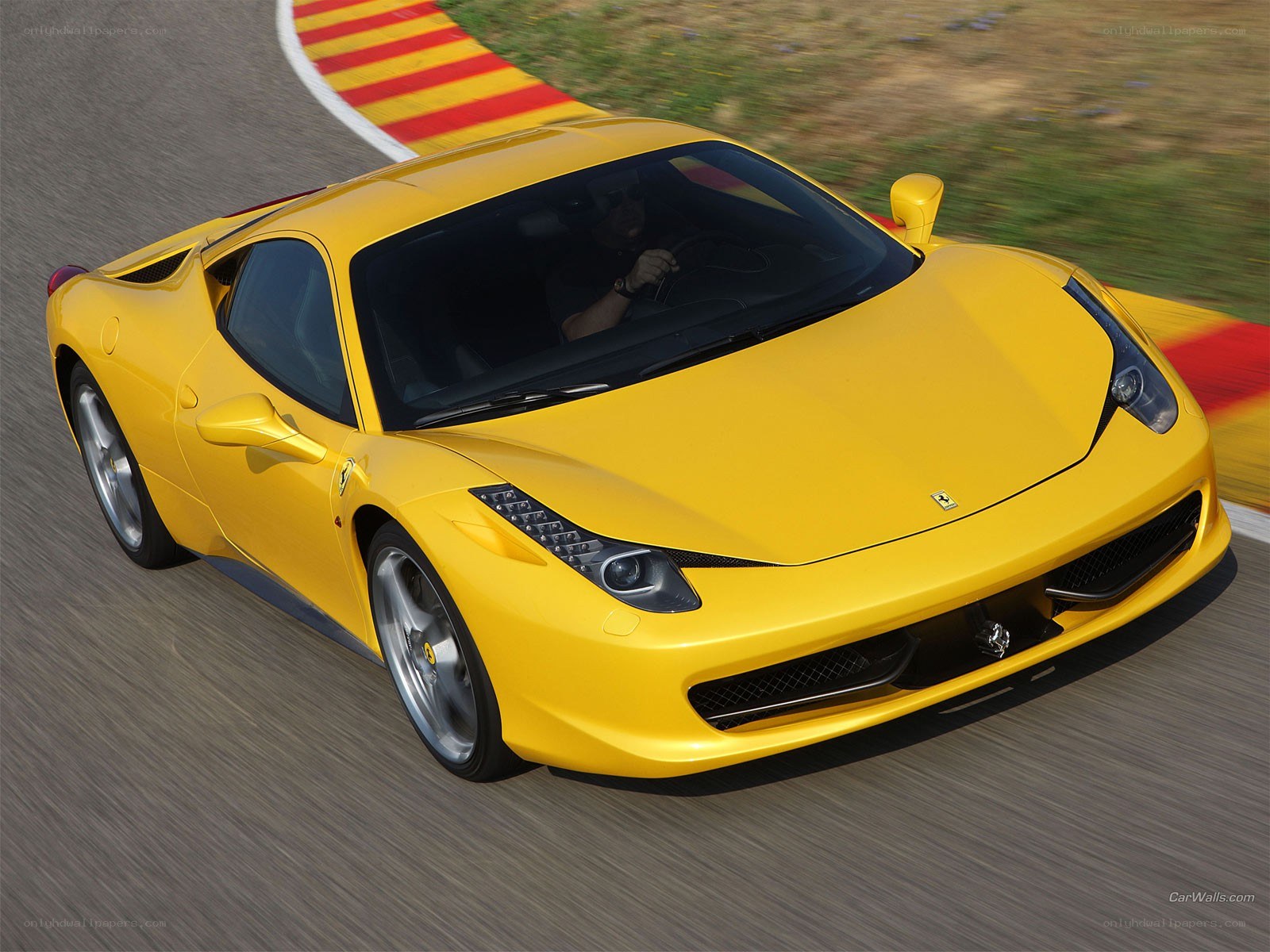 yellow ferrari on racetrack