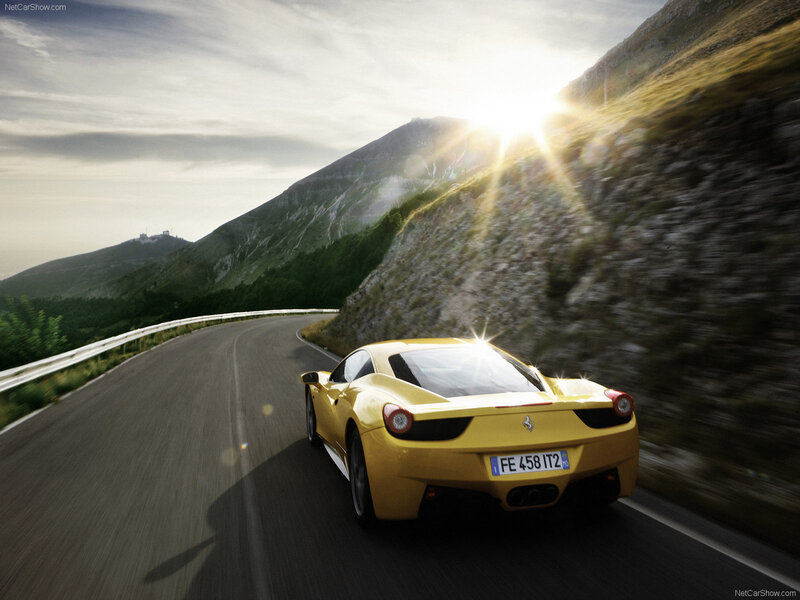 Yellow Ferrari on Road — Dramatic