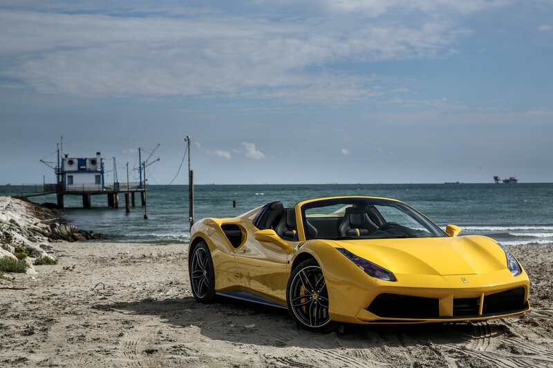 Yellow Ferrari on the beach