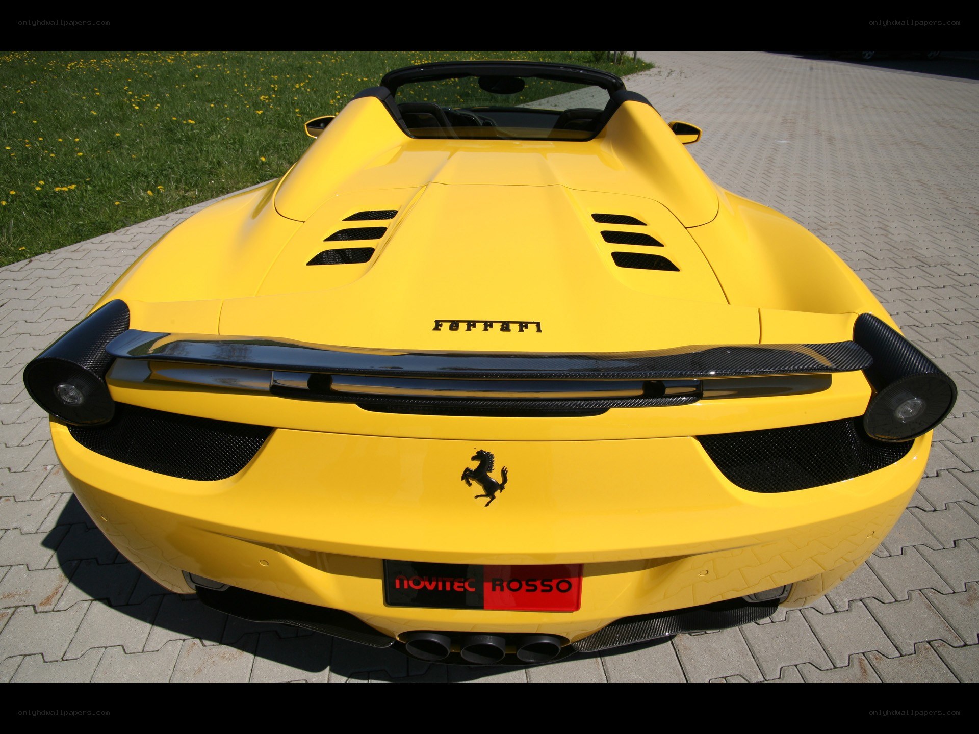 Yellow Ferrari rear view