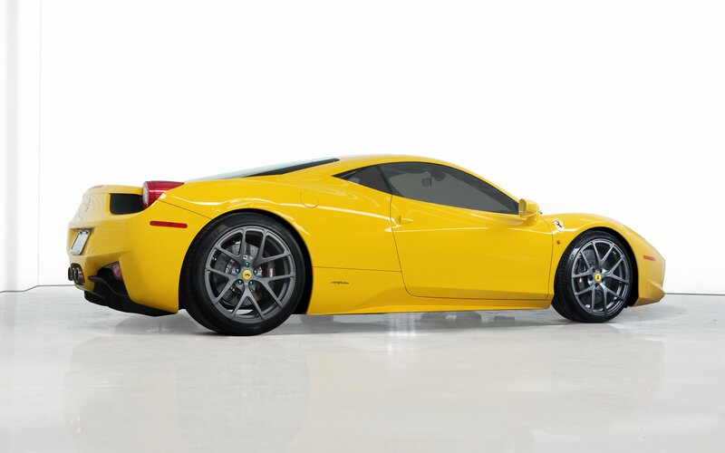 yellow ferrari sports car